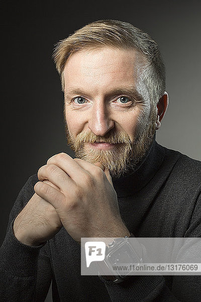 Portrait of blond man with full beard