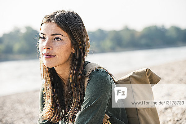 Portrait of smiling young woman outdoors