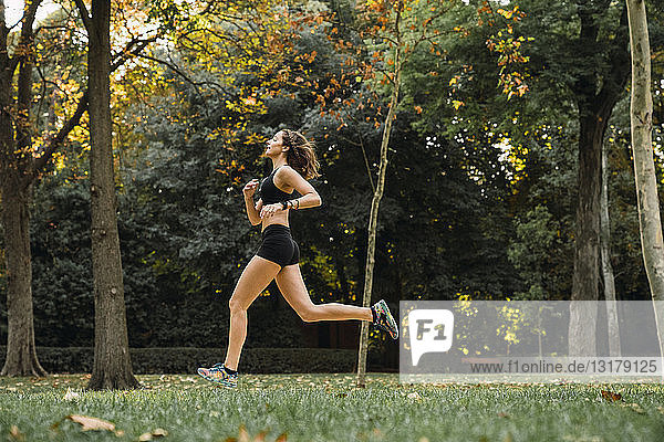 Young woman running in a park