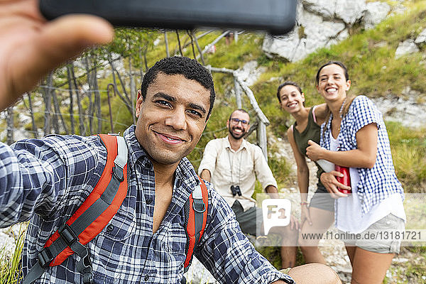 Italy  Massa  friends taking a selfie and hiking in the Alpi Apuane