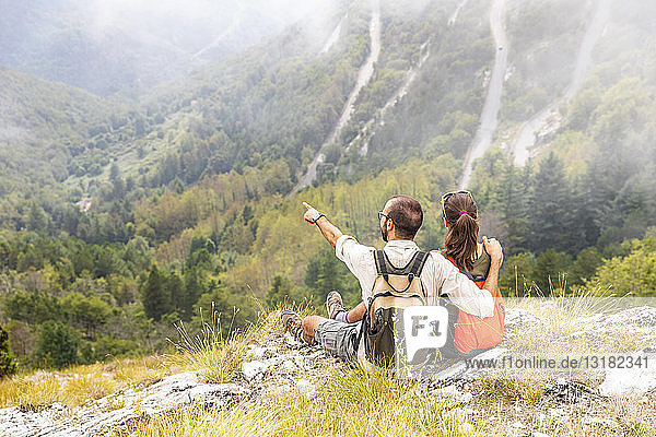 Italy  Massa  couple looking at the beautiful view in the Alpi Apuane