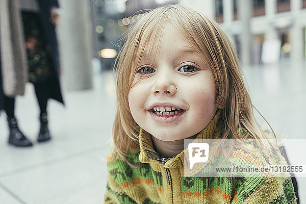 Portrait of young girl mother in the background