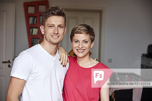 Portrait of smiling couple at home