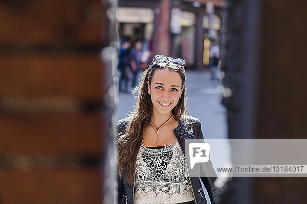 Portrait of fashionable young woman in the city