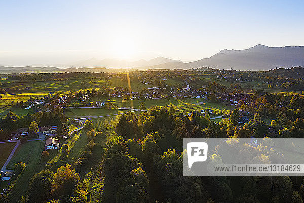 Germany Upper Bavaria Alpine Foreland Aerial view of Seehausen at sunrise
