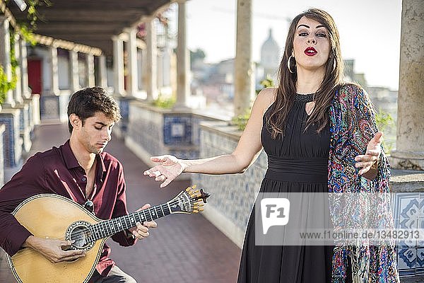 Band performing traditional music fado under pergola with portuguese tiles called azulejos in Lisbon  Portugal  Europe