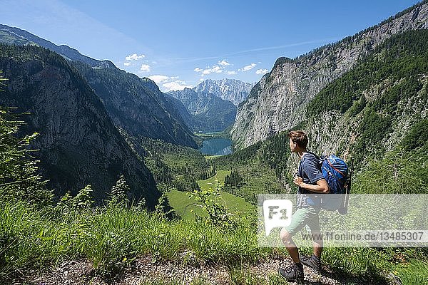 View on the lakes Obersee and Königsee  hikers on the Röthsteig  in the back Watzmann  Berchtesgaden  Upper Bavaria  Bavaria  Germany  Europe