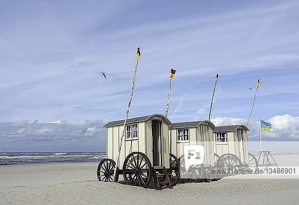 Old bathing carts used as changing rooms on the eastern beach  Norderney  Lower Saxony  Germany  Europe