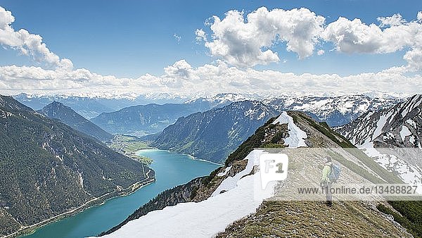 Hiker on hiking trail  crossing from the Seekarspitz to the Seebergspitz  Tyrol  Austria  Europe