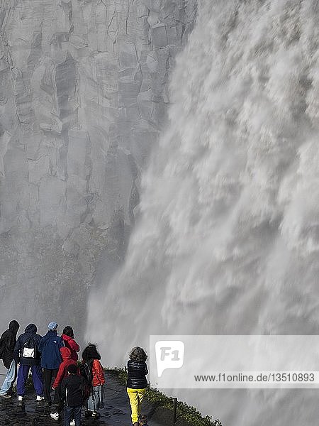 Tourists at Godafoss waterfall  falling water masses  Northern Iceland  Iceland  Europe