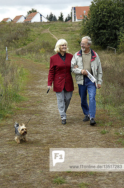 Old married couple on a trip with dog  berlin  germany