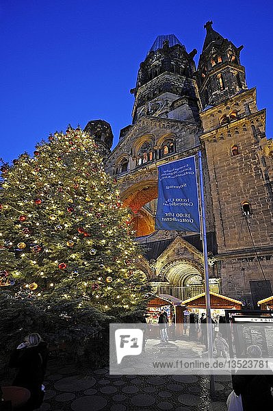 Christmas market in front of the Kaiser-Wilhelm-Gedaechtniskirche Memorial Church  Breitscheidplatz square  Berlin  Germany  Europe
