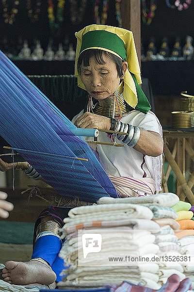 Padaung or long neck woman weaving  Inle lake  Myanmar  Asia