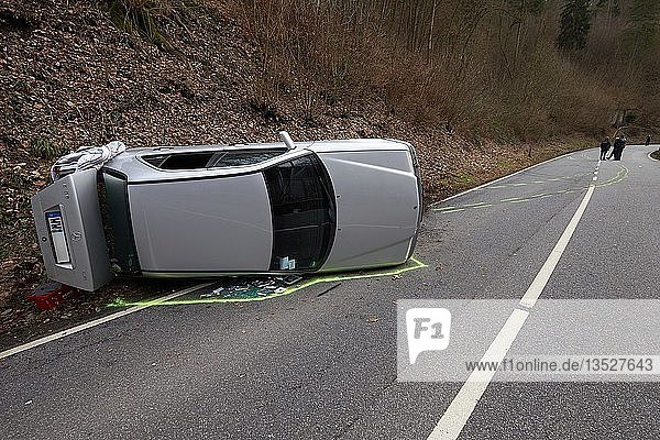 A car overturned in an accident on the L307 Vallendar between Vallendar and Höhr-Grenzhausen. Four people were injured  Vallendar  Rhineland-Palatinate  Germany  Europe