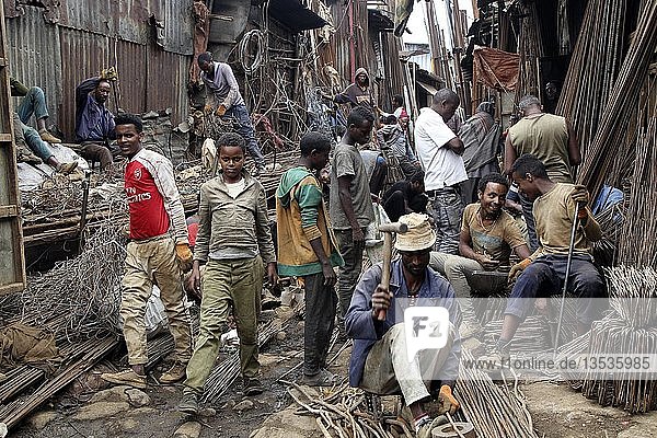 Metal dealer with hardware in front of corrugated-iron huts  market  Addis Ababa  Ethiopia  Africa