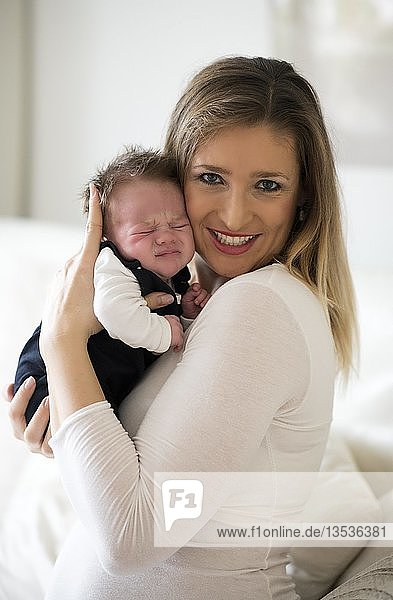 Mother holding baby  4 weeks  Baden-Württemberg  Germany  Europe