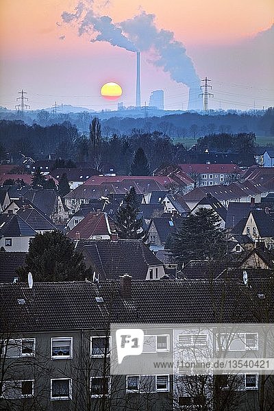 Housing estate with the Gersteinwerk power plant at sunset  Hamm  Ruhr Area  North Rhine-Westphalia  Germany  Europe
