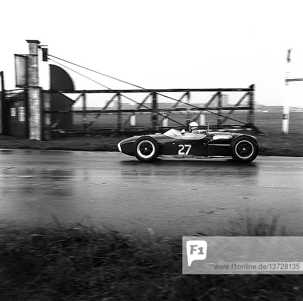 Tony Marsh in the Lotus-Climax at Anchor Crossing Corner in the VI Aintree 200  England 22 April 1961.