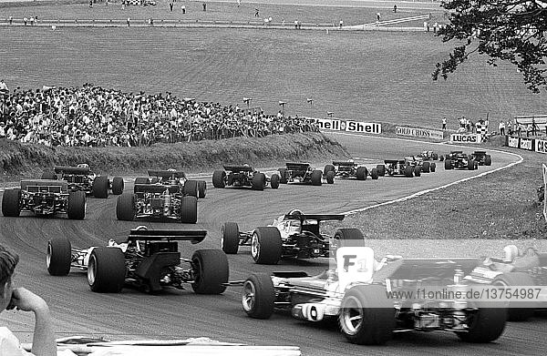'First lap pack leaving Druid´s Hill hairpin and diving down into Bottom Bend British GP  Brands Hatch  England 18 July 1970. '