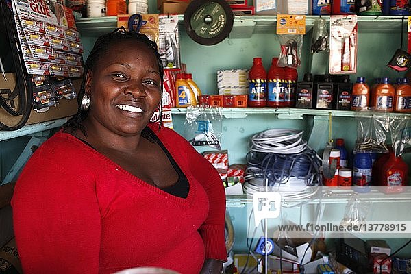 Beatrix Wanjiku  in her hardware shop financed by her 3rd loan from Opportunity microcredit (80 000 KS)   Kenya