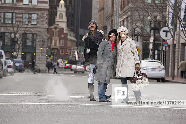 Brazilian woman with her family out for shopping  State Street  Boston  Massachusetts  USA