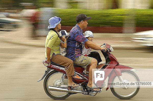 Cambodian family on a motorcycle  Phnom Penh  Cambodia.