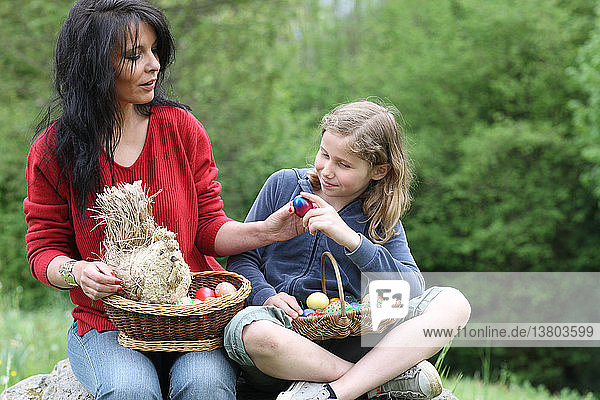 Mother  daughter and easter eggs.