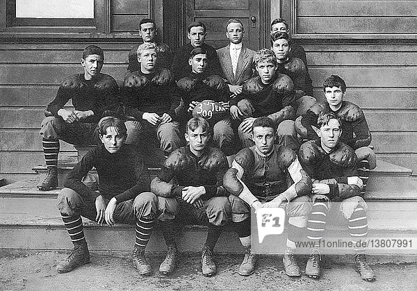 United States: 1909 A portrait of a high school football team titled ´Third Team ´09´.