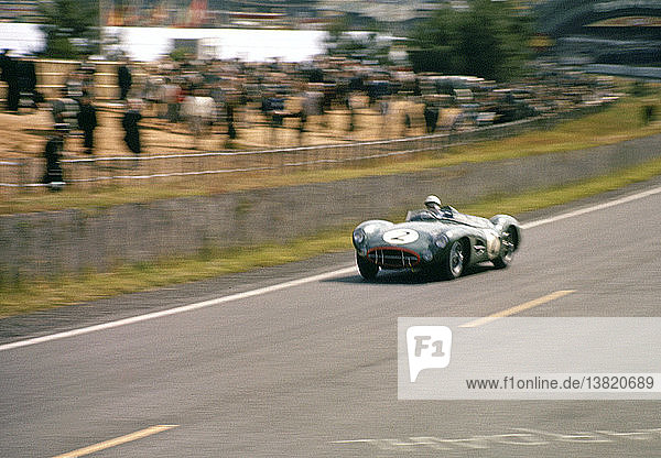 'Stirling Moss-Jack Brabham´s Aston Martin DBR1-300 in the Dunlop Curve just after pits area  Le Mans  France  22 June 1958. '