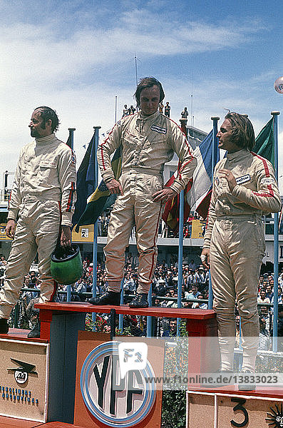 VIII Gran Premio de la Republica  Argentina  24th January 1971  podium Henri Pescarolo 2nd  Chris Amon winner and Carlos Reutemann  3rd.
