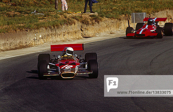 South African GP  Kyalami 7th March 1970. Car no 10  John Miles  Lotus-Cosworth 49C  finished 5th and car no 22  Piers Courage  De Tomaso-Cosworth  retired.