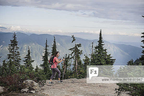 Woman hiking on mountaintop  Dog Mountain  BC  Canada
