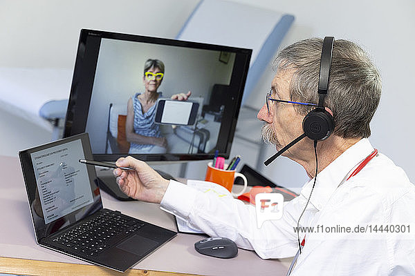 Video consultation between a doctor and patient who wishes to have her medical tests explained.