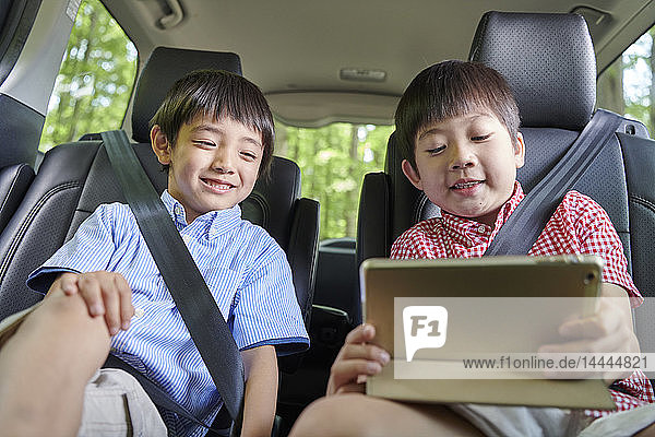 Japanese kids in the car