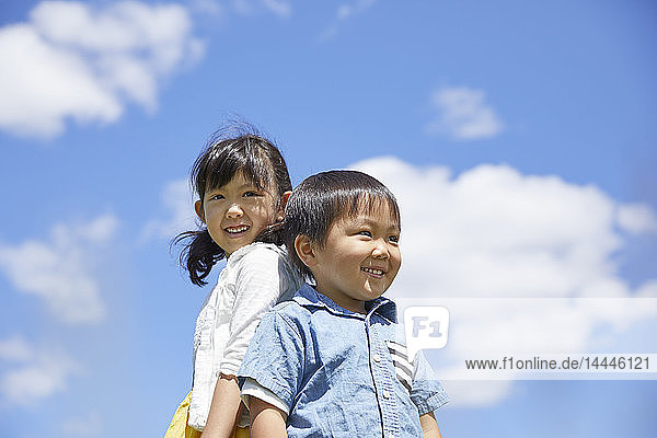 Japanese kids in a city park