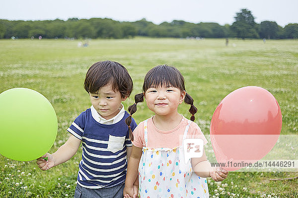 Japanese kids at a city park
