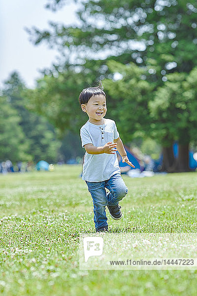 Japanese kid in a city park