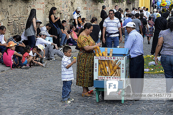 Ice-cream vendor during Holy week  Antigua  Guatemala  Central America.