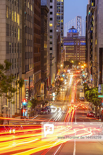View of California Street and Oakland Bay Bridge at dusk  San Francisco  California  United States of America  North America