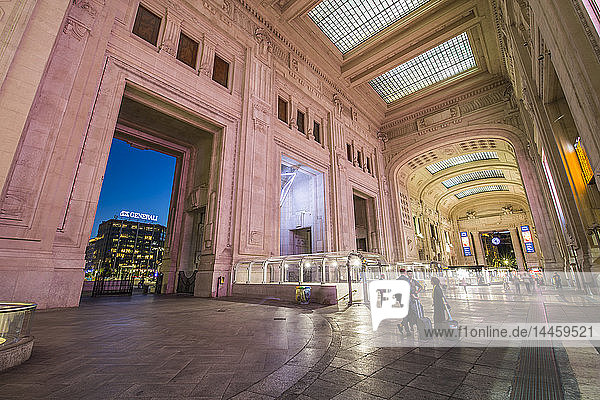 View of interior of Milan Central Station at dusk  Milan  Lombardy  Italy