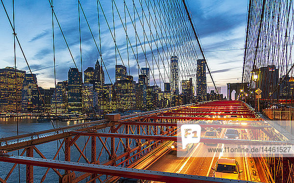 Manhattan skyline from the Brooklyn Bridge at night  New York  United States of America  North America