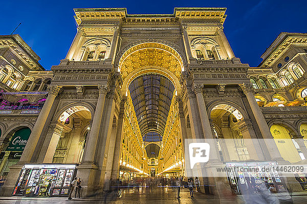 View of Galleria Vittorio Emanuele II in Piazza Del Duomo illuminated at dusk  Milan  Lombardy  Italy