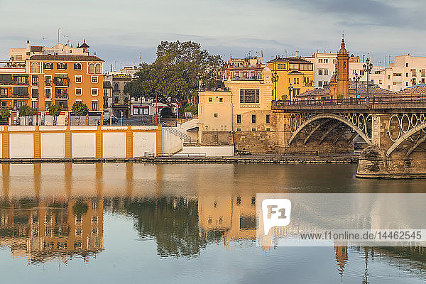 The Triana Neighbourhood seen from the banks of Guadalquivir River at first sunlight  Seville  Andalusia  Spain