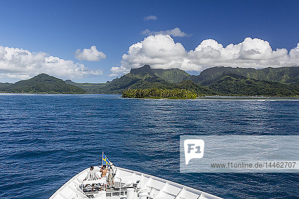 On approach to Raiatea through a break in the atoll reef Society Islands French Polynesia South Pacific