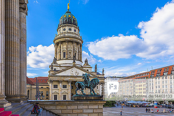 Statue in front of French Cathedral on Gendarmenmarkt square  Berlin  Germany