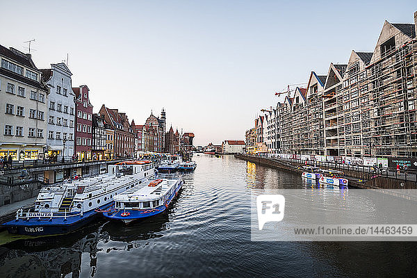 Hanseatic League houses on the Motlawa River at sunset in the pedestrian zone of Gdansk  Poland