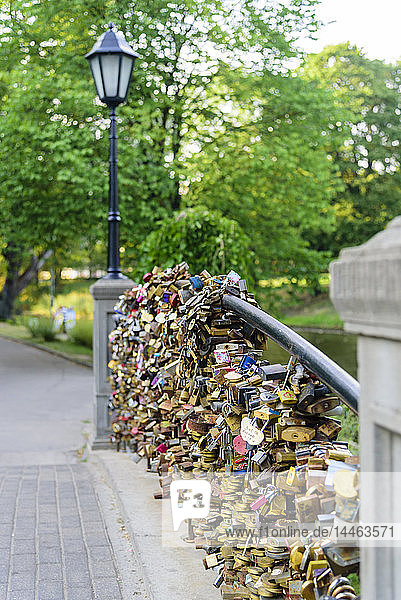 Lovers Locks on Bridge Bastejkalnna Parks Riga Latvia