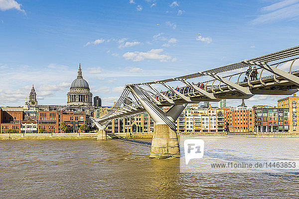 St. Paul's Cathedral and the Millennium Bridge over the River Thames  London  England  United Kingdom