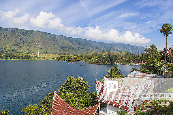 Typical Batak houses overlooking Lake Toba  Tuk Tuk  Lake Toba  Samosir Island  Sumatra  Indonesia  Southeast Asia  Asia