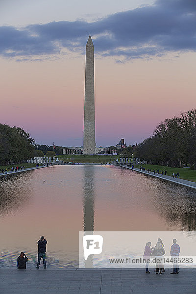 Evening with tourists Washington Monument taken from Lincoln Monument Washington D.C. United States of America